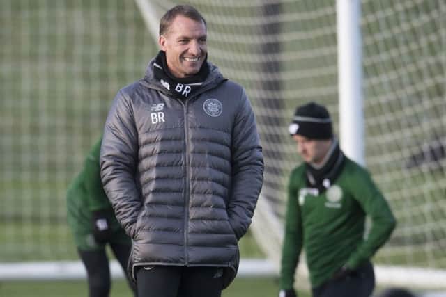 Brendan Rodgers was all smiles at Lennoxtown but he had a warning for his players about respecting opponents. Picture: SNS Group