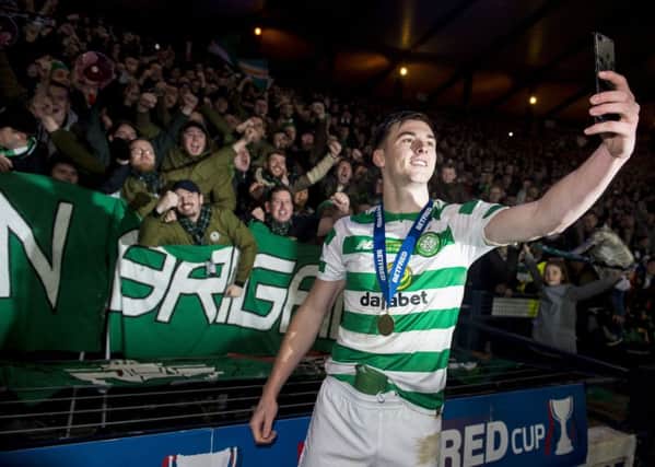 Kieran Tierney at full time with the fans after Celtic secure a seventh trophy under Brendan Rodgers' leadership. Picture: SNS Group