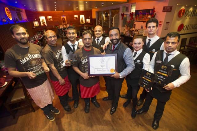 Michael Singh and his staff at Bombay Lounge, High Street, Dalkeith.