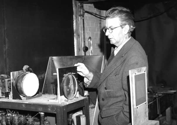 Scottish electrical engineer and television pioneer John Logie Baird giving a demonstration in his laboratory of his latest advance in colour television. Picture: Getty Images