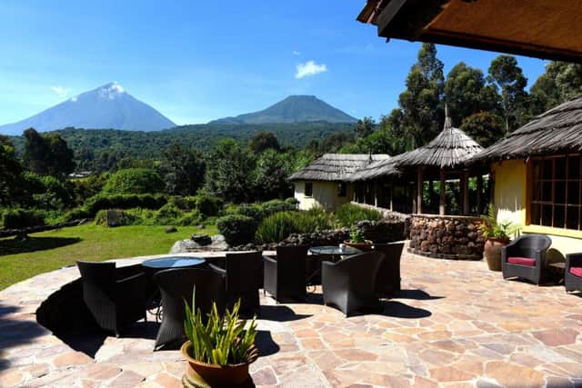 Mount Gahinga Lodge, with Mount Gahinga and Mount Muhavura in the distance Picture: Lisa Young