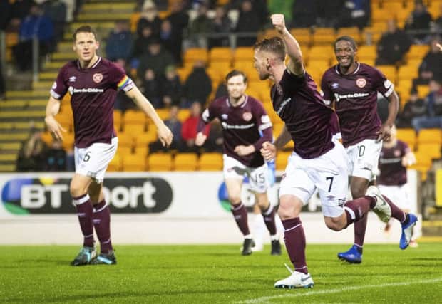 Oliver Bozanic celebrates after putting Hearts back in front just before the break. Picture: SNS