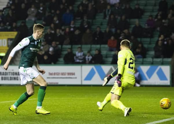 Hibs striker Oli Shaw scores his side's first equaliser on the night. Picture: SNS