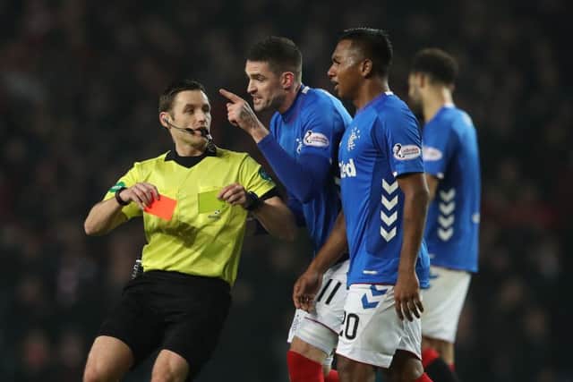 Alfredo Morelos sees red as Kyle Lafferty remonstrates with referee Steven McLean. Picture: Getty