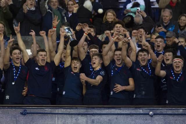 The jubilant Merchiston Castle players celebrate their U18 cup win. Picture: Gary Hutchison/SNS/SRU