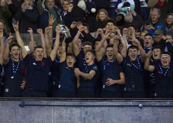 The jubilant Merchiston Castle players celebrate their U18 cup win. Picture: Gary Hutchison/SNS/SRU