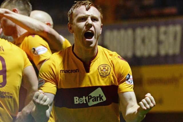 Danny Johnson celebrates after making it 1-1. Picture: SNS