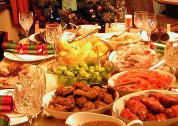 A table groaning with lovingly prepared Christmas fare, but will snowflakes at the table be able to resist posting about it on insta-twit-book?