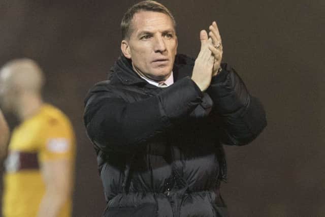 Brendan Rodgers applauds the Celtic supporters. Picture: Craig Foy/SNS