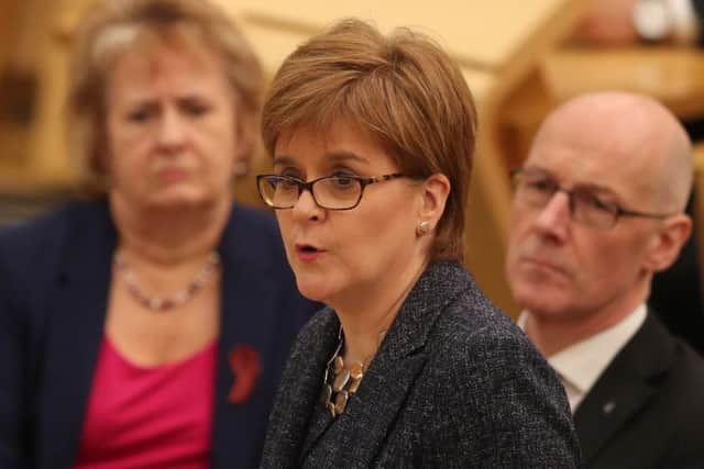 First Minister Nicola Sturgeon has been urged to commit to no further tax increases ahead of next week's budget. Picture: PA Wire