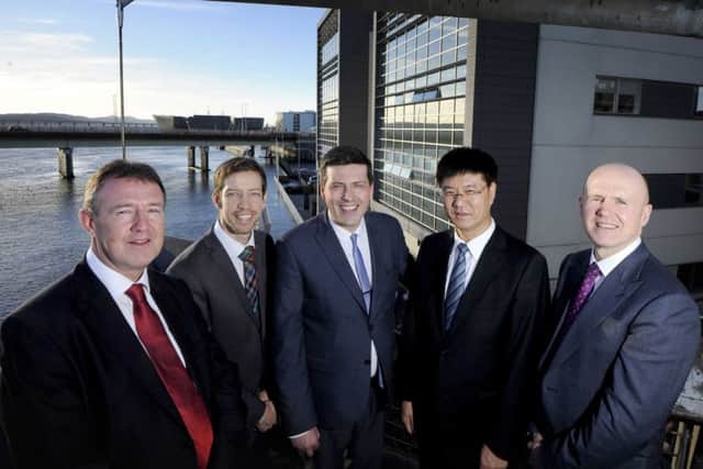 L to R: Norman McLennan, COES; Councillor John Alexander; Jamie Hepburn MSP; Hong Chong, president, COES; and Neil Francis, director, Scottish Development International. Picture: Colin Hattersley
