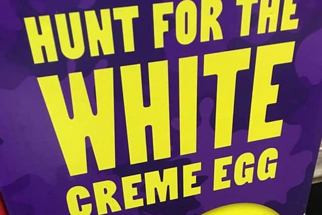 The Cadbury creme egg display extolling a competition to find a Â£10,000 white chocolate egg- that doesnt start until January. Picture: SWNS