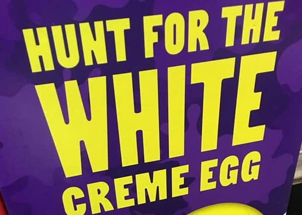 The Cadbury creme egg display extolling a competition to find a Â£10,000 white chocolate egg- that doesnt start until January. Picture: SWNS