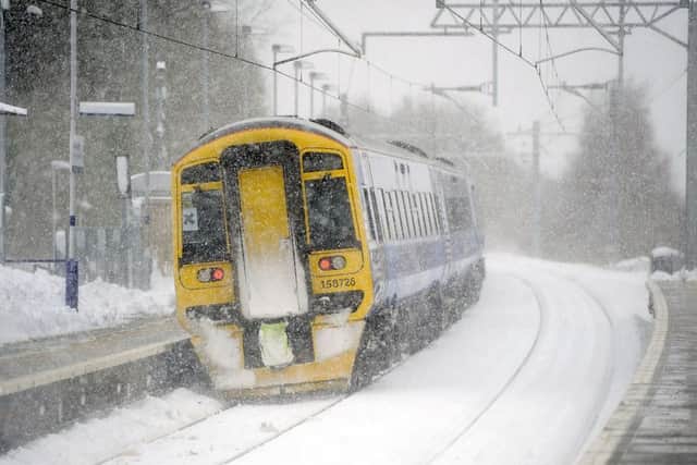 You could be entitled to a refund if your train service is delayed is bad weather. Picture: Michael Gillen