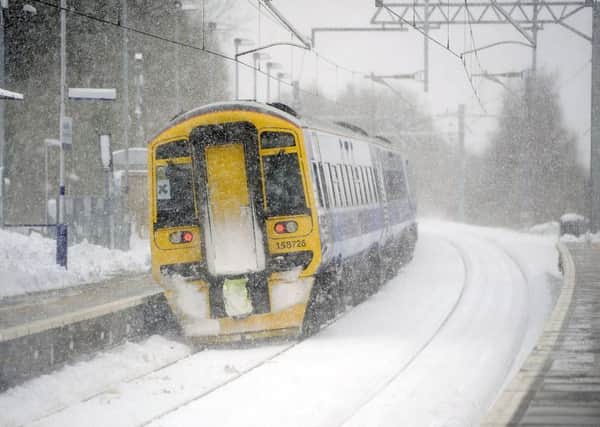 You could be entitled to a refund if your train service is delayed is bad weather. Picture: Michael Gillen