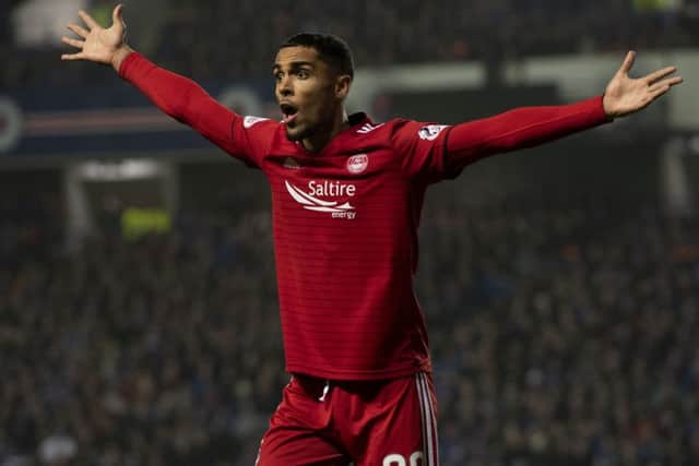 Aberdeen's Max Lowe appeals to the linesman during their 1-0 win over Rangers at Ibrox. Picture: Craig Williamson/SNS