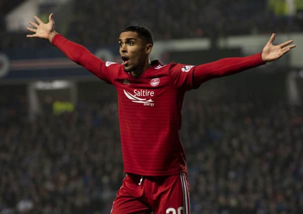 Aberdeen's Max Lowe appeals to the linesman during their 1-0 win over Rangers at Ibrox. Picture: Craig Williamson/SNS