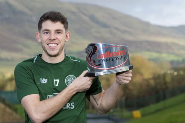 Celtic's Ryan Christie with the Ladbrokes Player of the Month Award for November.