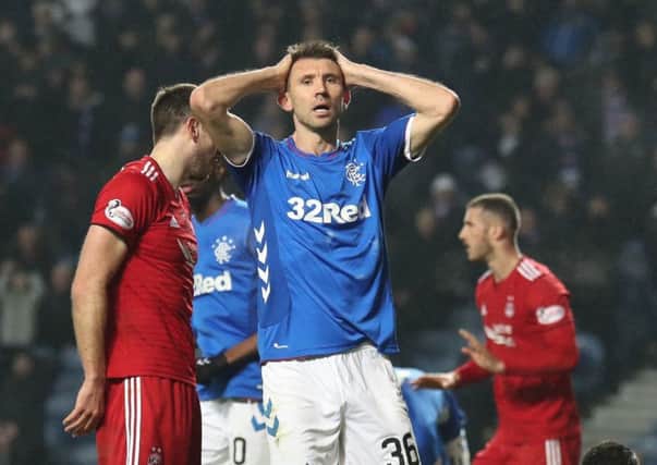 Rangers' Gareth McAuley reacts to a missed chance during the 1-0 defeat by Aberdeen. Picture: Andrew Milligan/PA Wire