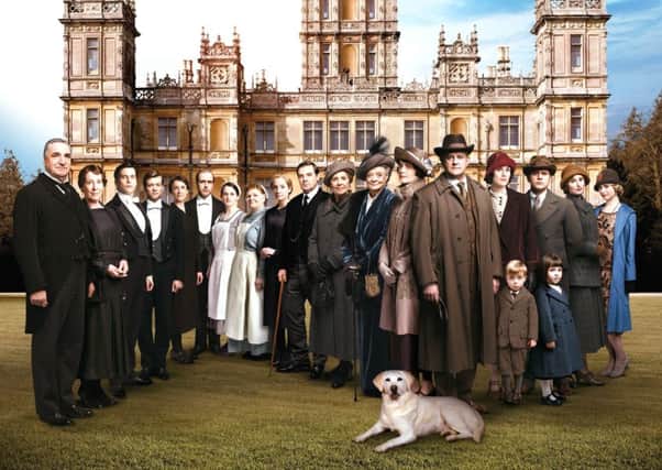 The composer behind the Downton Abbey soundtrack has said he had to become English in order to craft the score that evokes a lost time.
