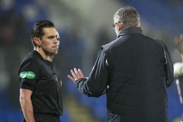Craig Levein confronts referee Andrew Dallas after Wednesday night's 2-2 draw at McDiarmid Park. Picture: SNS