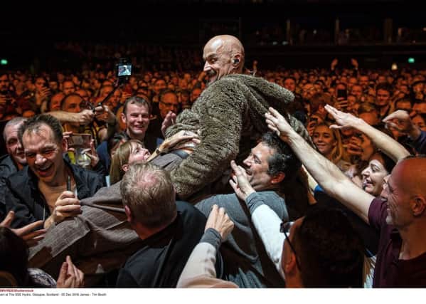 James frontman Tim Booth was happy hugging, head-rubbing and  crowd-surfing