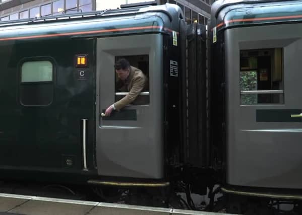 The ScotRail video shows travellers how to lean out of the window and pull down the door handle on the 40-year-old trains.