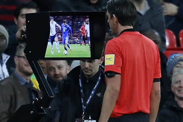 Video Assistant Referees were used at the World Cup in the summer but it is an expensive system. Picture: Ian Kington/Getty