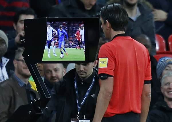 Video Assistant Referees were used at the World Cup in the summer but it is an expensive system. Picture: Ian Kington/Getty