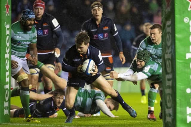 Edinburgh's Chris Dean goes over to score a try against Newcastle. Picture: Ross Parker/SNS/SRU