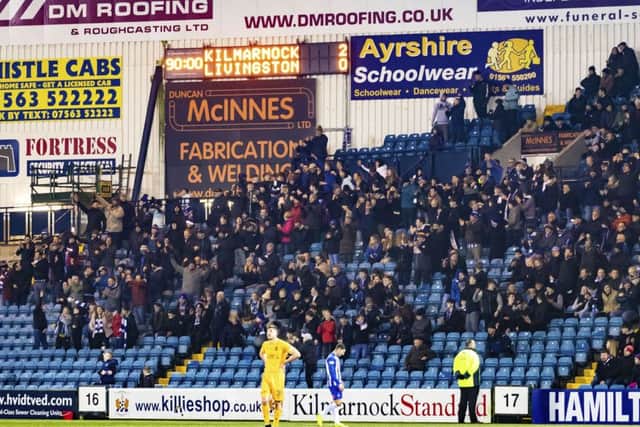 Kilmarnock supporters celebrate after beating Livingston. Pic: SNS