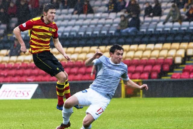 Blair Spittal strikes to fire Partick Thistle ahead. Pic: SNS/Bruce White