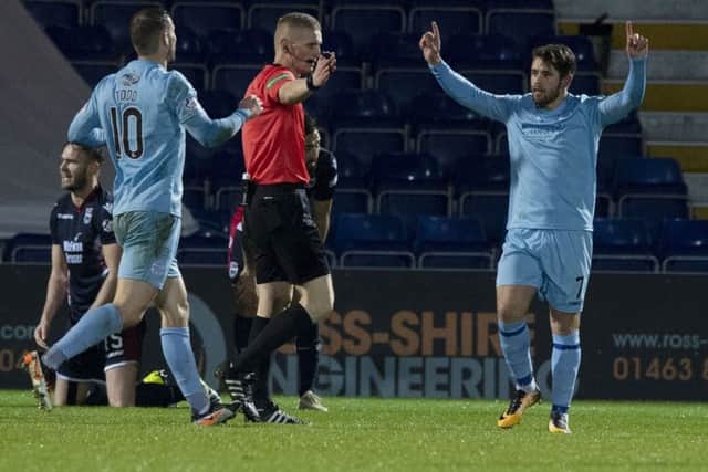Queen of the South's Andrew Stirling celebrates his equaliser. Pic: SNS/Paul Devlin