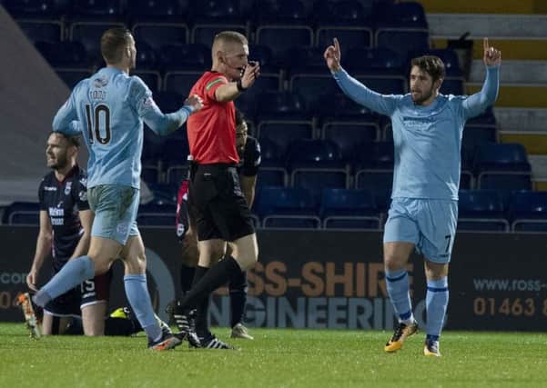 Queen of the South's Andrew Stirling celebrates his equaliser. Pic: SNS/Paul Devlin