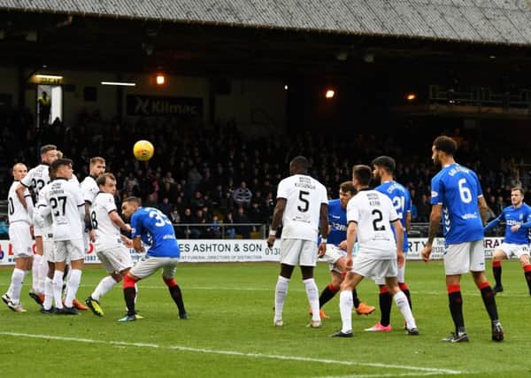 Andy Halliday curls in a delightful free-kick to draw Rangers level at Dens Park. Picture: SNS.