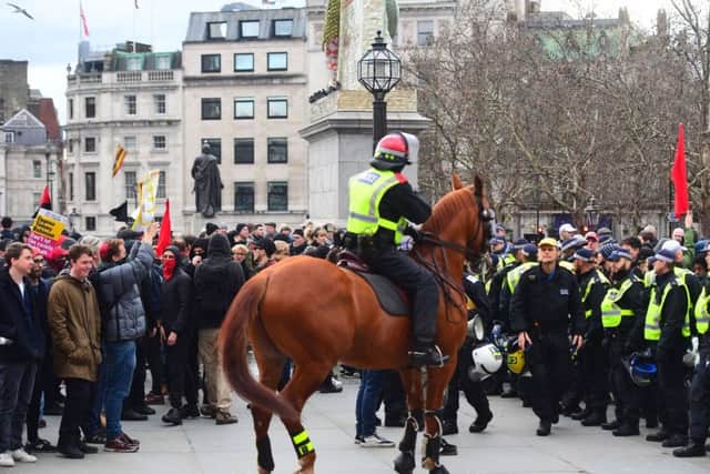 Police officers attempts to keep rival protesters from clashing in Trafalgar Square, London, as people take part in an anti-fascist counter-demonstration against a "Brexit Betrayal" march and rally organised by Ukip. Picture: Victoria Jones/PA Wire