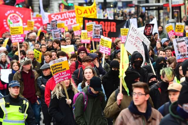 People take part in an anti-fascist counter-demonstration against a "Brexit Betrayal" march and rally organised by Ukip in central London. Picture: Victoria Jones/PA Wire