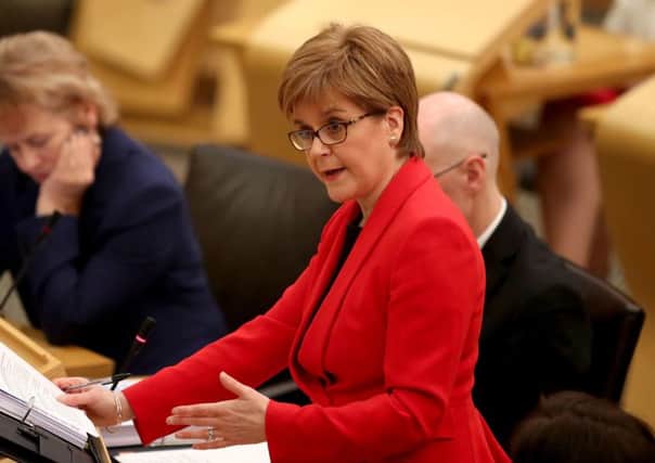 Nicola Sturgeon had to ask who Tory MSP Tom Mason was during First Minister's Questions today. Picture: PA