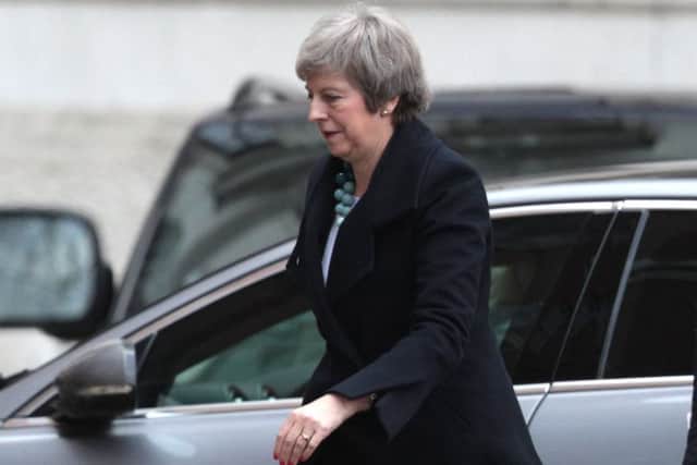 On a tumultuous day in Westminster, Theresa May arrives in Downing Street (Picture: Getty)