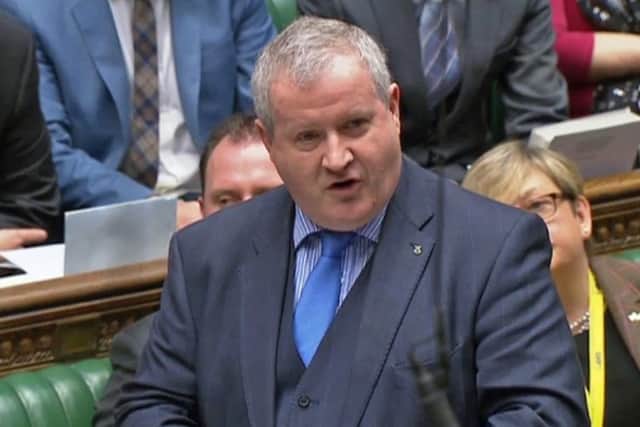 SNP Westminster leader Ian Blackford speaks in the House of Commons. The MP has criticised Theresa May's decision to put off a vote on her Brexit deal