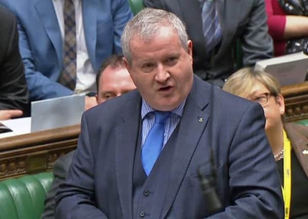 SNP Westminster leader Ian Blackford speaks in the House of Commons. The MP has criticised Theresa May's decision to put off a vote on her Brexit deal