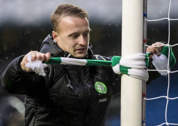 Leigh Griffiths ties a Celtic scarf to a goalpost in Ibrox after a 2-1 win over Rangers in December 2016. Picture: SNS Group