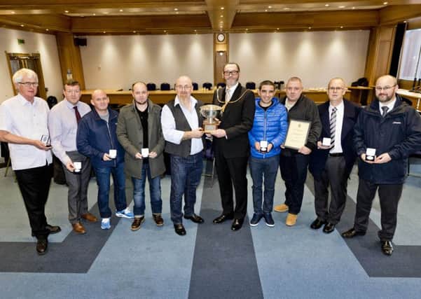 South Lanarkshire provost Ian McAllan congratulates the Grounds Services team who care for Uddingston War Memorial