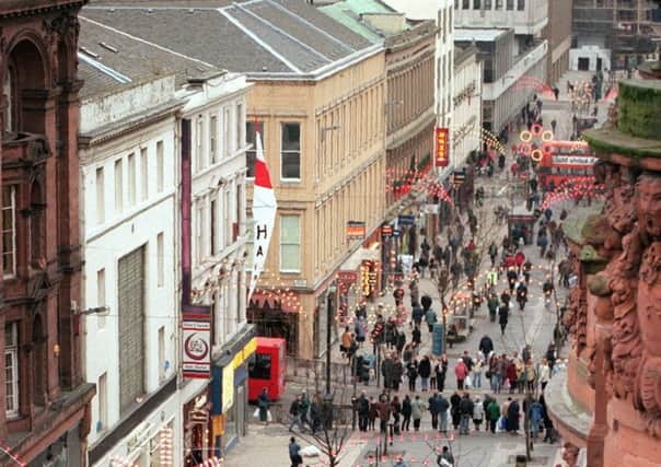 Glasgows Sauchiehall Street draws in shoppers from far and wide but high street spending is declining (Picture: Allan Milligan)