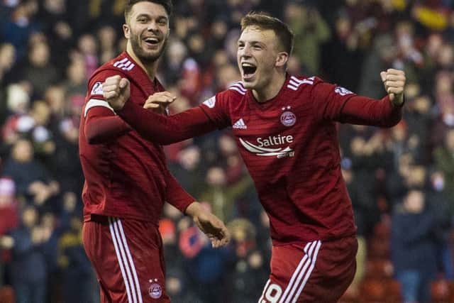 Aberdeen matchwinner Lewis Ferguson, right, celebrates his goal with Connor McLennan. Picture: Alan Harvey/SNS