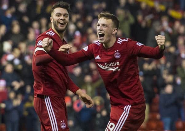 Aberdeen matchwinner Lewis Ferguson, right, celebrates his goal with Connor McLennan. Picture: Alan Harvey/SNS