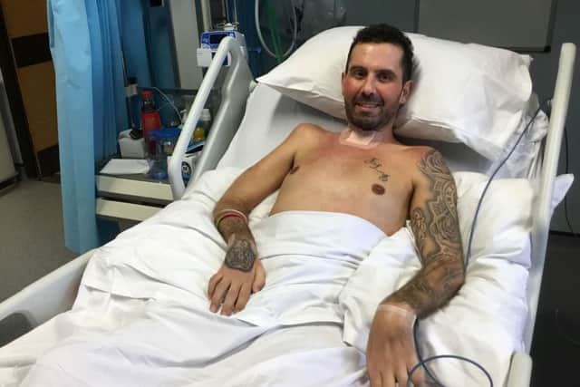 David Braham pictured in hospital recovering from a curry induced paralysis. Picture: SWNS