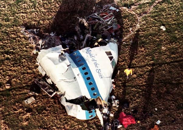 Wreckage of Pan Am flight 103 on the ground at Lockerbie (Picture: Martin Cleaver/AP)