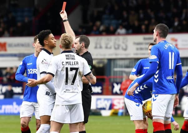 Nathan Ralph, left, is sent off during Sunday's match with Rangers. Picture: SNS