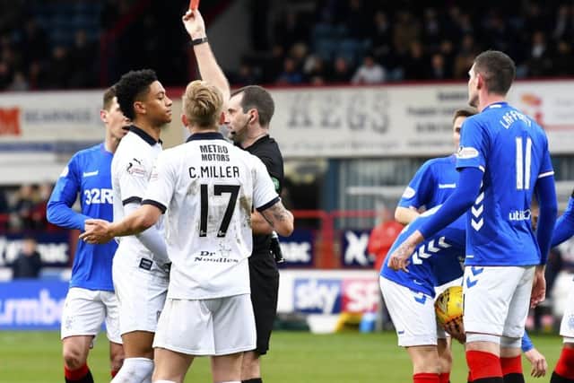 Nathan Ralph, left, is sent off during Sunday's match with Rangers. Picture: SNS